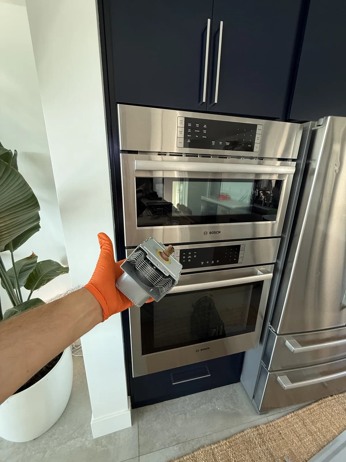 OPUS technician completing a high-end appliance service call in San Diego