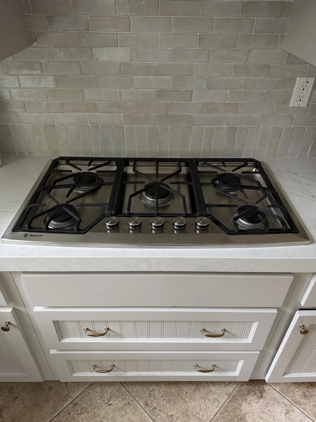 GE Monogram gas cooktop serviced by OPUS in San Diego