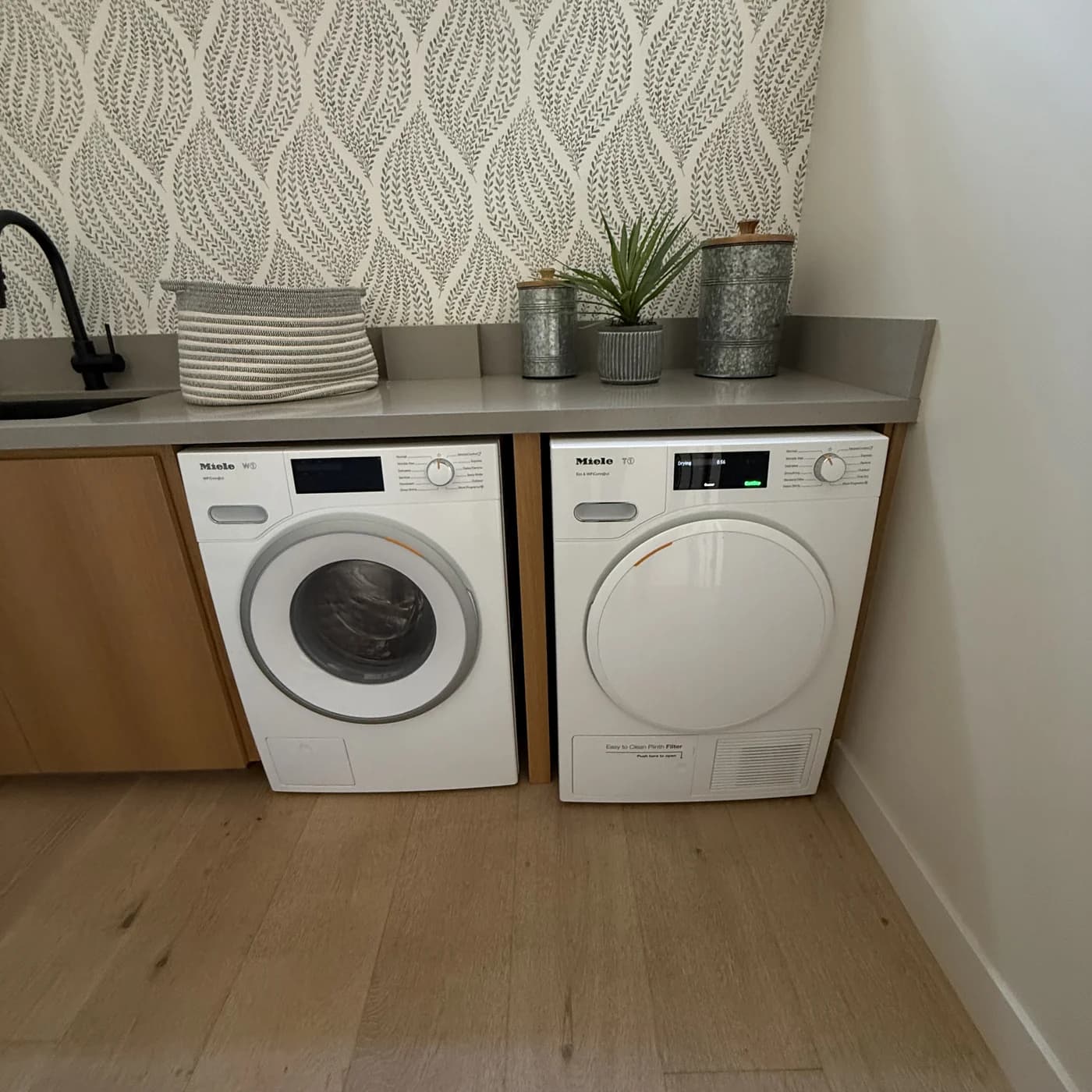Miele T1 ventless heat-pump washer and dryer pair serviced by OPUS in San Diego