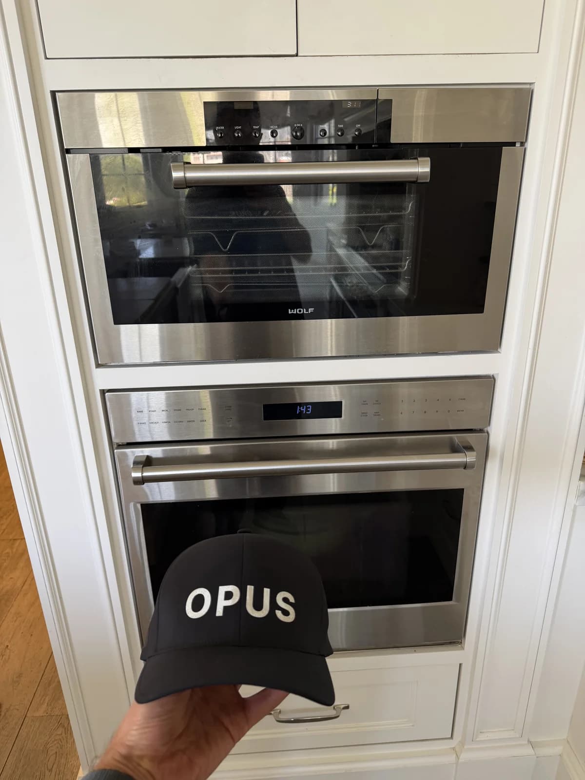 OPUS technician working on a Wolf oven — OPUS service in Carlsbad