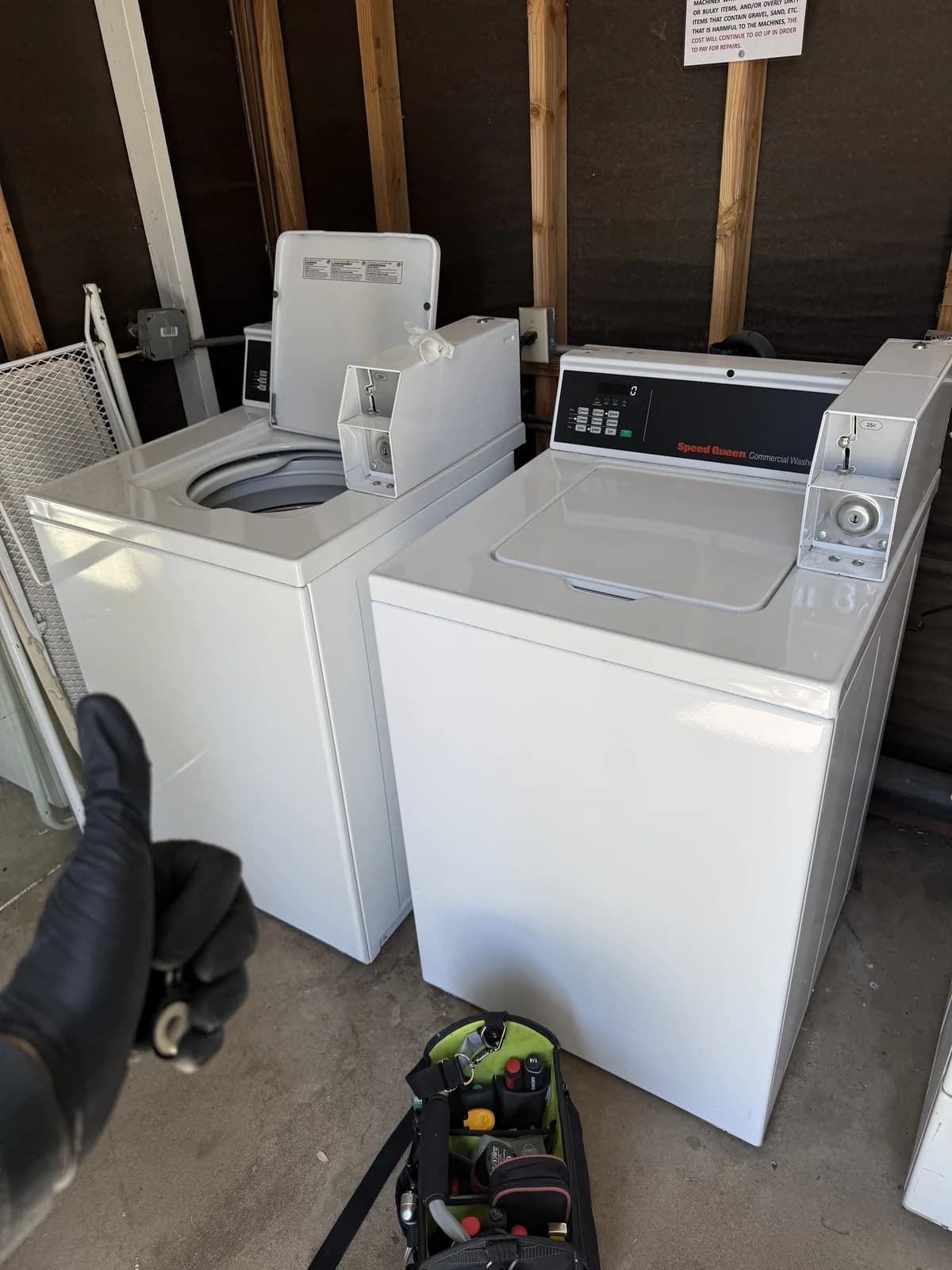 Speed Queen washer and dryer pair in a residential laundry room serviced by OPUS in San Diego