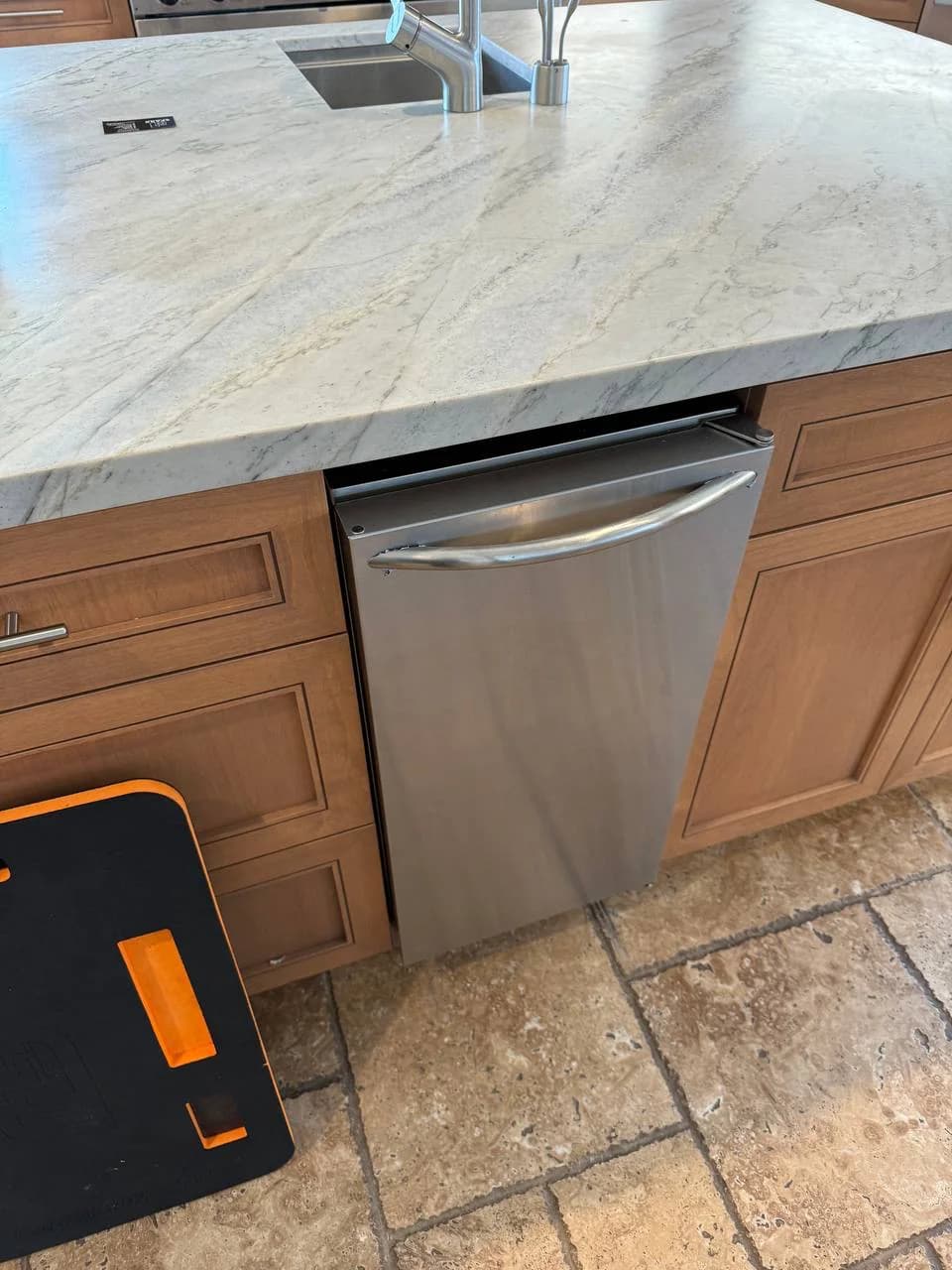 Under-counter ice maker serviced by OPUS in San Diego