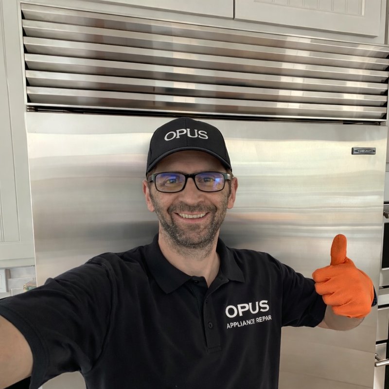 OPUS technician performing appliance repair in San Diego